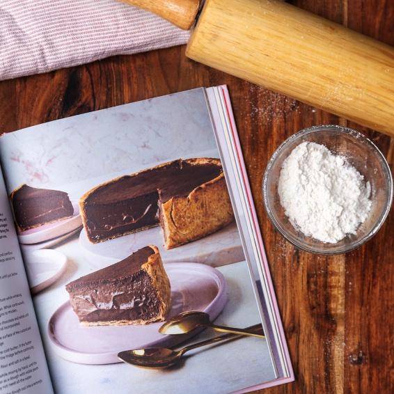 Page featuring chocolate cheesecake from Chocolate All Day by Kirsten Tibballs